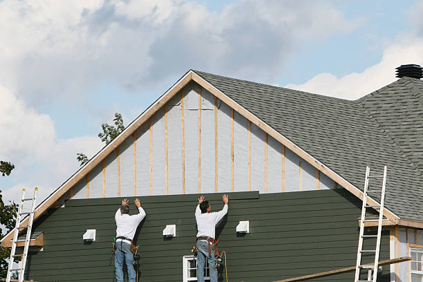 Professional Siding technician working in Westover, WV